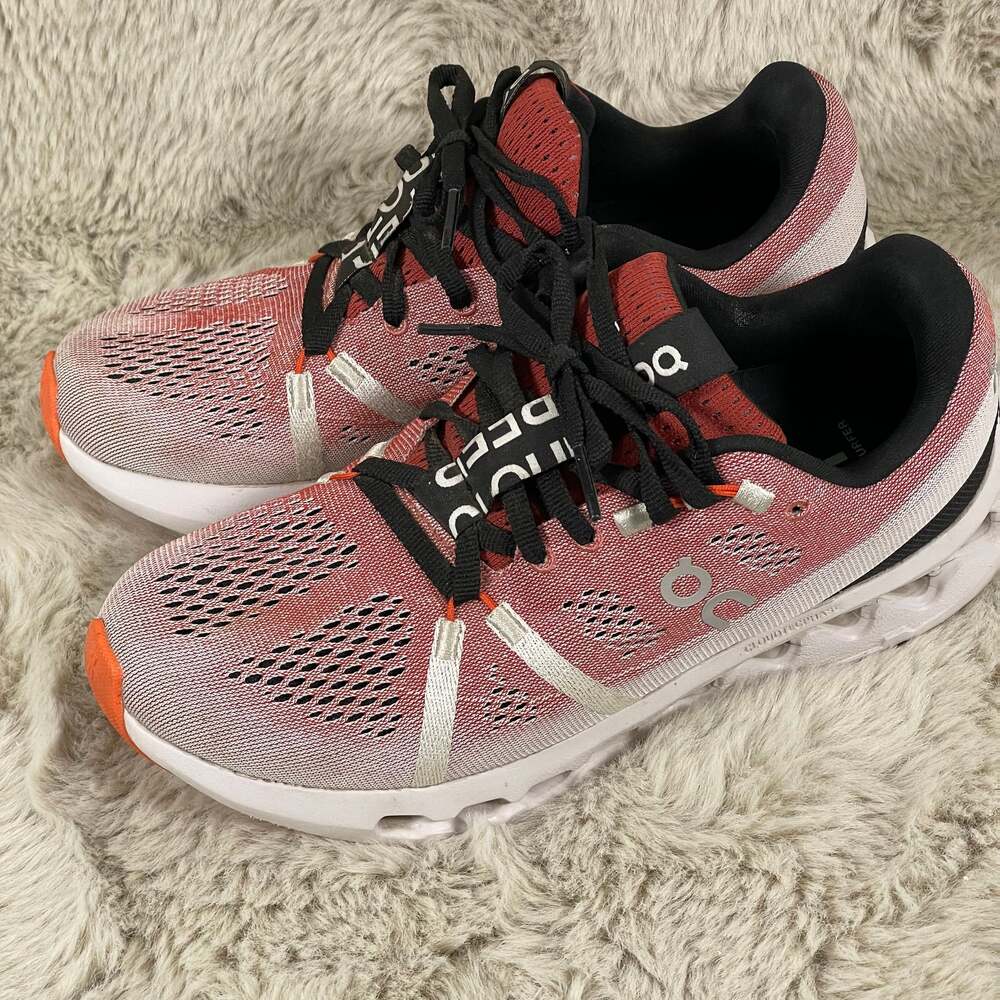 On Running Women's Pink Black White Sneakers with Orange Accents